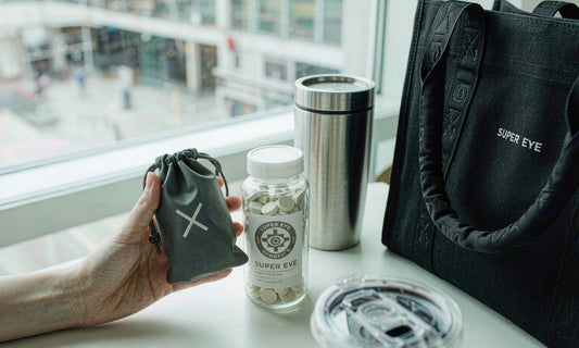 On-the-go travel scene with a supplement pouch and DAO gummies by a window.